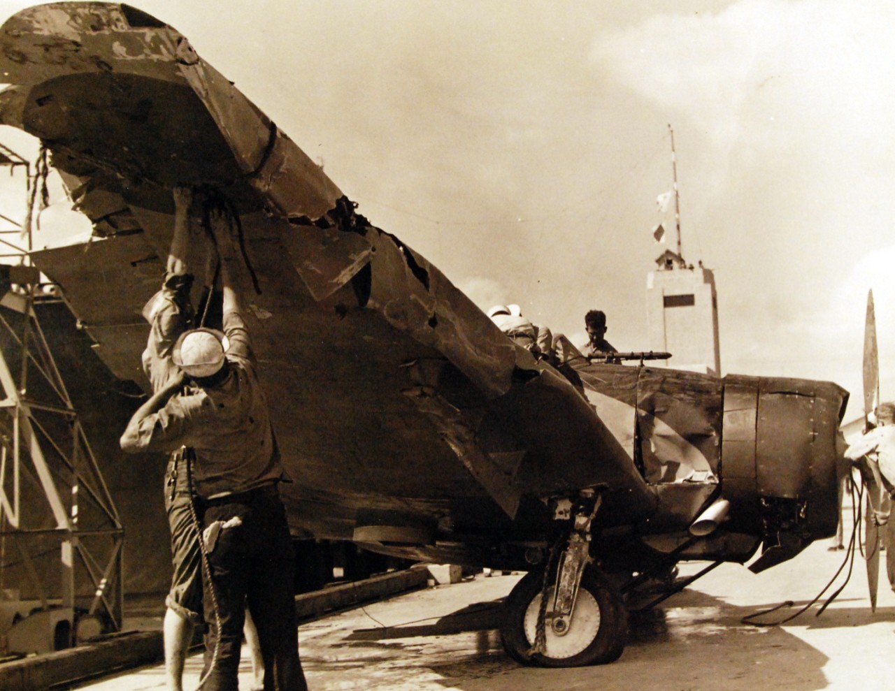 80-G-32441:  Japanese Attack on Pearl Harbor, December 7, 1941.  Damaged Japanese Navy Type 99 Carrier Bombers (Vals) at Pearl Harbor.  This plane was from Japanese aircraft carrier Kaga. Official U.S. Navy photograph, now in the collections of the National Archives.     (9/15/15).