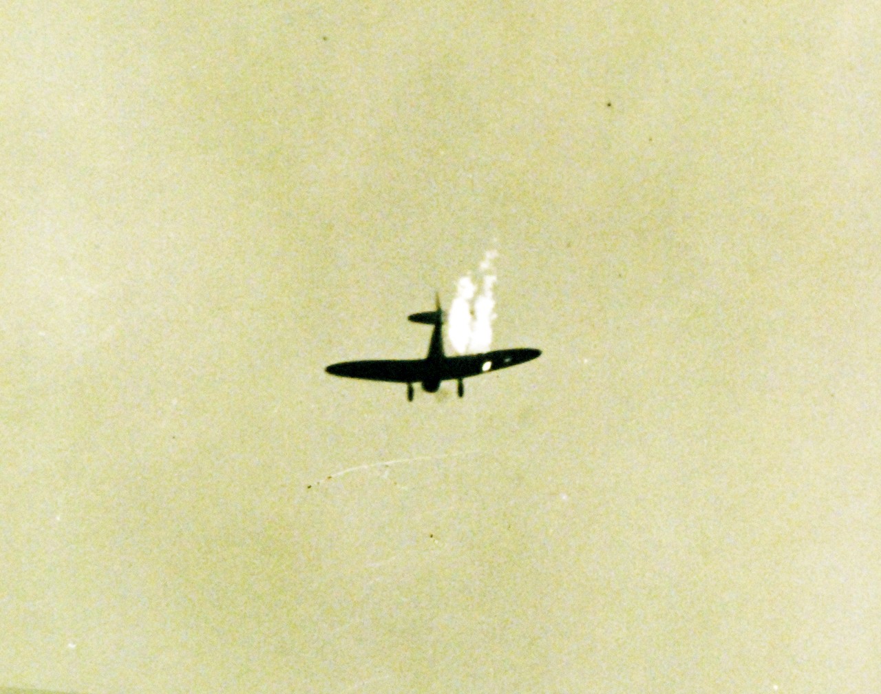 80-G-32952:  Japanese Attack on Pearl Harbor Attack, 7 December 1941.   Japanese Navy Type 99 Carrier Bomber, an Aichi D3A “VAL”,  shot down at Pearl Harbor during the Japanese Attack.  U.S. Navy photograph, now in the collections of the National Archives.  (9/13/2013).