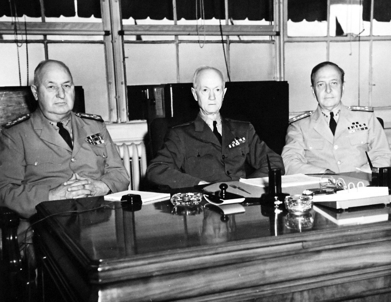 80-G-46137:   Members of the Court of Inquiry ordered by the Secretary of the Navy to inquire into the circumstances connected with the Japanese attack on Pearl Harbor are snapped as they sit in session in the Navy Department in Washington, D.C.  President of the Court is Admiral Orin G. Murfin, USN, (Retired), (center).  The other members are Admiral Edward C. Kalbfus, USN, (Retired), (left), and Vice Admiral Adolphus Andrews, USN, (Retired).  Released July 24, 1944.  U.S. Navy Photograph, now in the collections of the National Archives.  (2016/07/05).