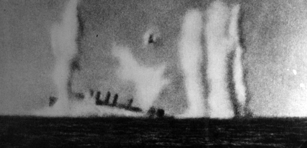80-G-179003:  USS Pope (DD 225) under attack from gunfire from IJN Myoko and Ashigara, air attacks, and scuttling charges during evacuation of Java, 28 February 1942.  She later sank on 1 March.  Photograph originally from a Japanese propaganda booklet Victory on the March.  U.S. Navy photograph, now in the collections of the National Archives.   (7/24/2013).