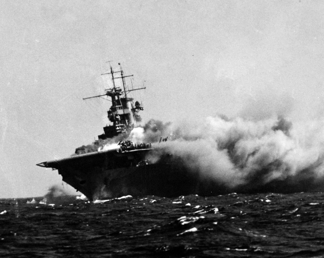 80-G-16331:   Loss of USS Wasp (CV 7), 15 September 1942.    Wasp burning and listing after being torpedoed by Japanese submarine I-19  while operating in the South Pacific supporting forces on Guadalcanal.   Official U.S. Navy Photograph, now in the collections of the U.S. Navy.    (2014/06/12).