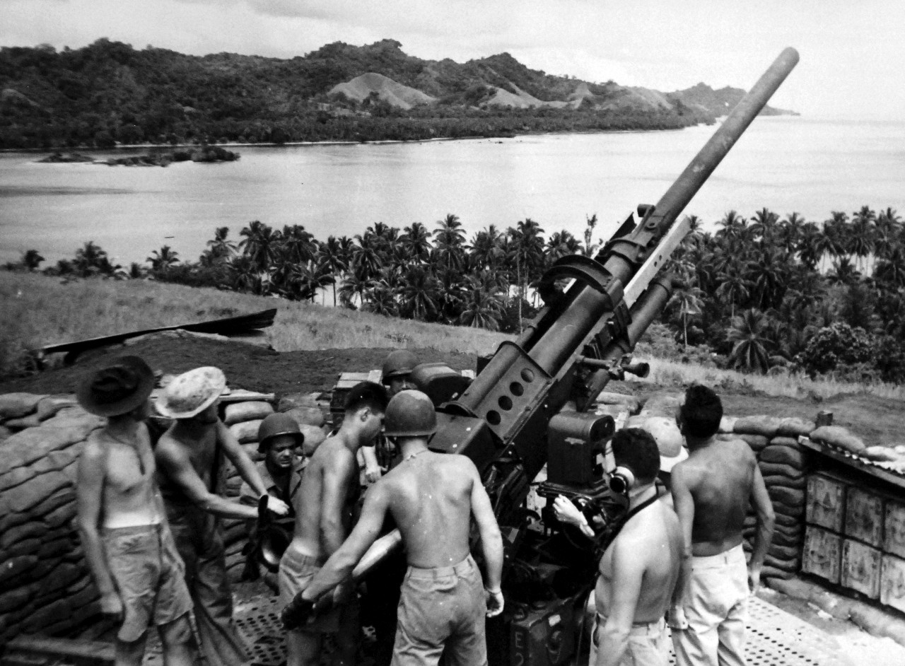 LC-Lot-801-15:  Guadalcanal Campaign, 7 August 1942 – February 9 1943. Members of the 1st Battalion, 11th Marines unlimbering an anti-aircraft gun during continuous training for their part in the defense of the island in the South Pacific.  U.S. Marine Corps Photograph.  Photographed through Mylar sleeve.  Courtesy of the Library of Congress.  (2015/11/06).