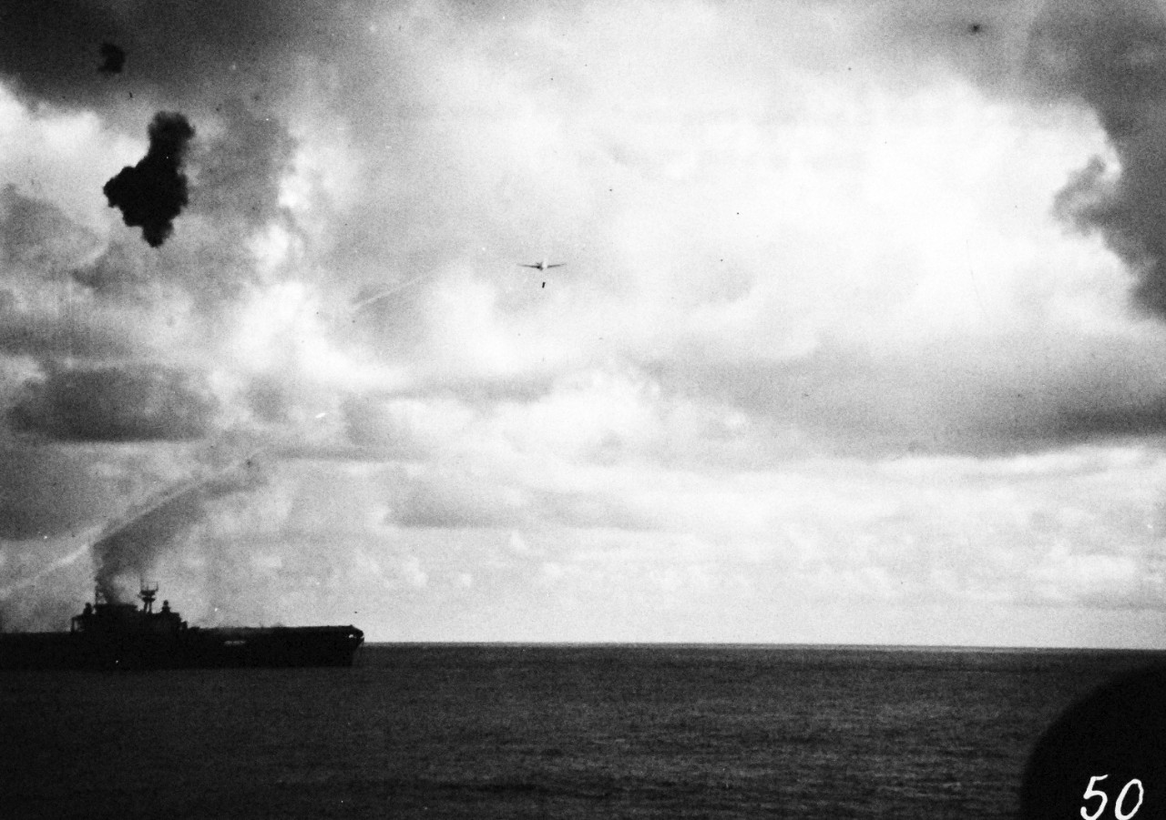 80-G-33960:  Battle of Santa Cruz Islands,  26 October 1942.   Sinking of USS Hornet (CV 8) by attacks from Japanese Nakajima B5N “Kate” torpedo bomber.  Photographed from USS Pensacola (CA 24).  U.S. Navy photograph, now in the collections of the National Archives.  (2015/11/17).