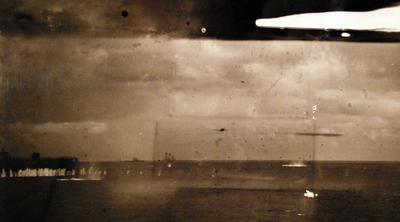 80-G-33966:  Battle of Santa Cruz Islands,  26 October 1942.   Sinking of USS Hornet (CV 8) by attacks from Japanese Nakajima B5N “Kate” torpedo bomber.  Photographed from USS Pensacola (CA 24).  U.S. Navy photograph, now in the collections of the National Archives.  (2015/11/17).