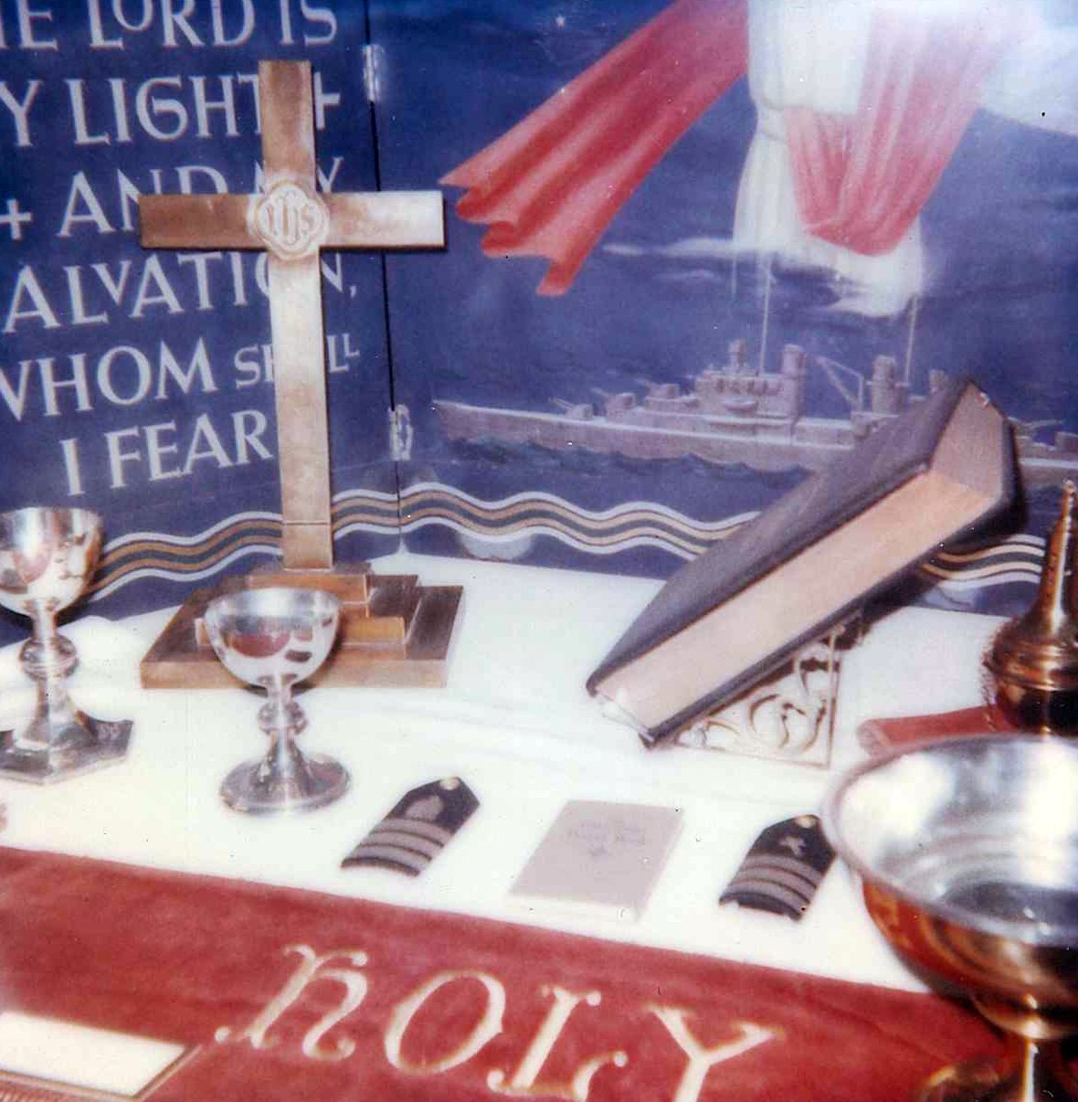 NMUSN-4561 (Color)   Navy Memorial Museum (now National Museum of the U.S. Navy), Chaplain’s Exhibit. This color photograph shows one of the cases utilized for the U.S. Navy Chaplain Corps exhibit on display at the museum for a couple of decades, circa 1970s. National Museum of the U.S. Navy Photograph.  
