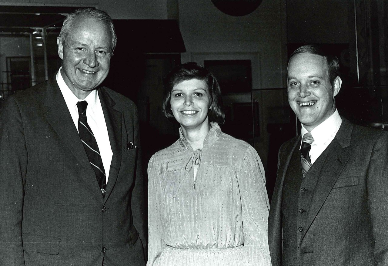 NMUSN-4404:   Mort Kunstler Art Exhibit, 1982.   Former Secretary oi the Navy J. William Middendorf, along with two unidentified guests at the art exhibit opening.   National Museum of the U.S. Navy Photograph Collection.