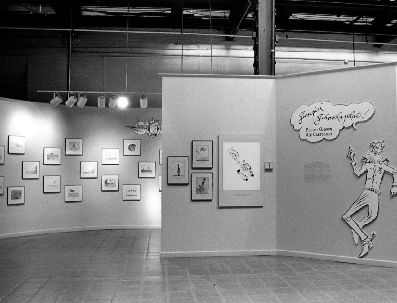 NMUSN-749 Robert Osborn Art Exhibit, 1991. Exhibit focused on the artist’s career with images of Dilbert and Grampaw Pettibone amongst others. National Museum of the U.S. Navy Photograph Collection.