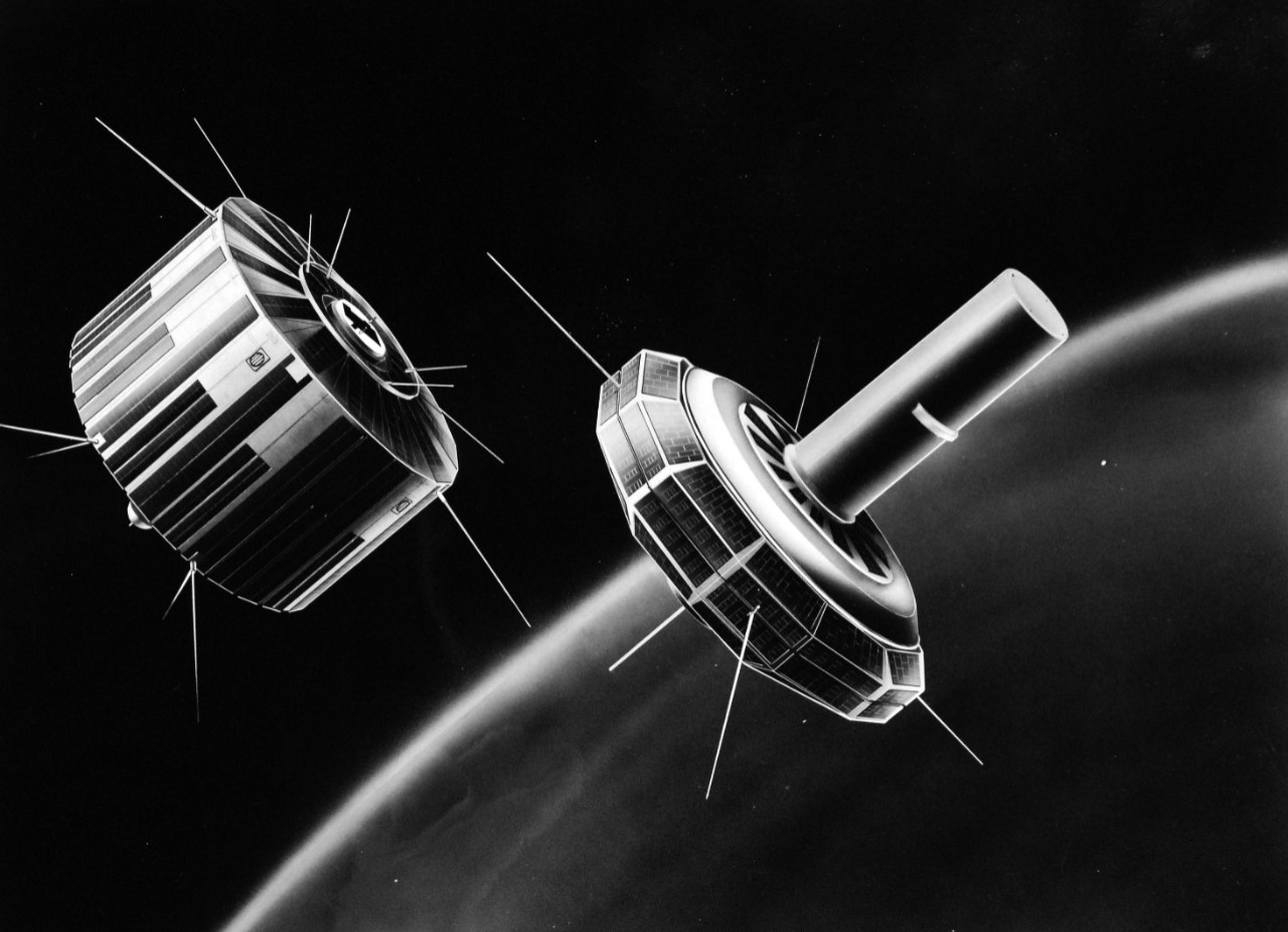 USN 710980:   Transit IV-B Conception Art.    Transit IV-B, Navy navigational satellite and its pick aback rider Transit Research and Altitude Control (TRAAC), an experiment in altitude stabilization by use of the Earth’s gravity, shown moments after separation in orbit some 500 miles up.  Transit IV-B is another major step by the Bureau of Naval Weapons to provide a worldwide all-weather navigational system.  TRAAC was developed for the Navy by the Applied Physics Laboratory of the Johns Hopkins University to test the unique satellite design which will keep the face of a satellite pointing to Earth forever by the means of gravity alone.   Photograph released  November 8, 1961.  Official U.S. Navy Photograph, now in the collections of the National Archives.  