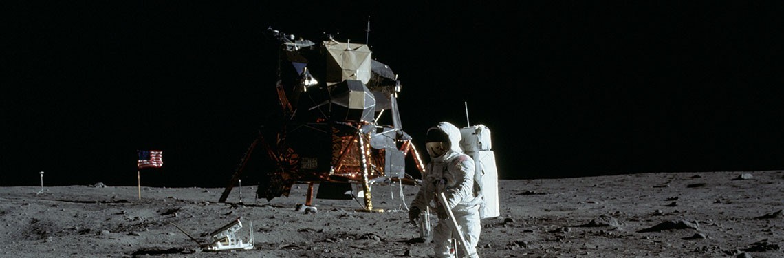 AS11-40-5949:  Astronaut Edwin Aldrin deploying the EASEP on surface of moon, July 20, 1969.   Courtesy of NASA Photograph Collection.  