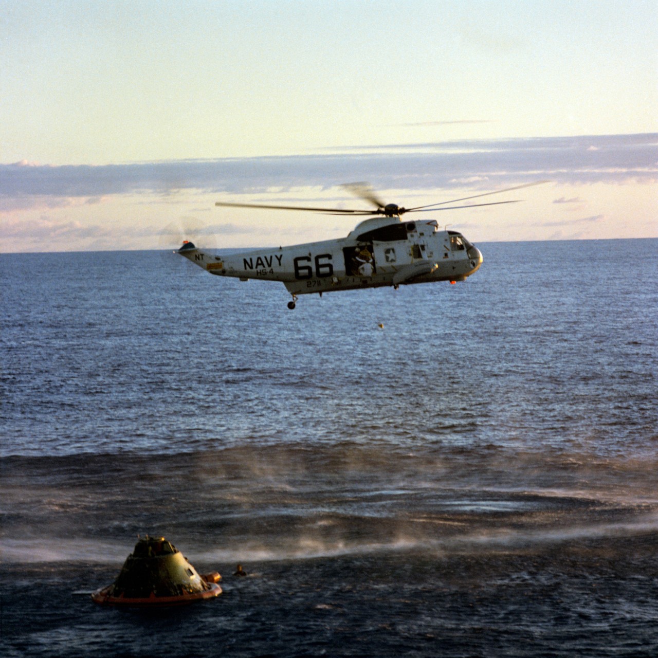 1969 - Helo 66 Recovers Charlie Brown Helicopter 66 of Helicopter Anti-Submarine Squadron Four hovers over Apollo 10’s Command Module (mission callsign “Charlie Brown”), 1968. The Navy used “66” to recover Astronauts from Apollo 8, 10, 11,12, and 13 and a national television audience saw it each time. As a result of its fame, the Navy purposely kept the number “66” on the bird even when the Navy switched to a three digit identification system. (Photo courtesy of NASA)