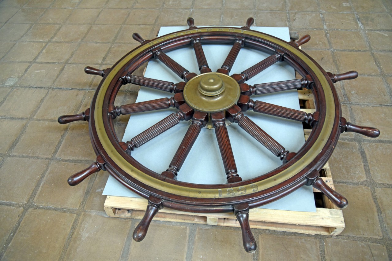 NMUSN-5142: Protected cruiser Albany’s Helm Wheel, December 2022. Wheel following being taken down from the Spanish American War display area. Official U.S. National Museum of the U.S. Navy Photograph. Digital only.