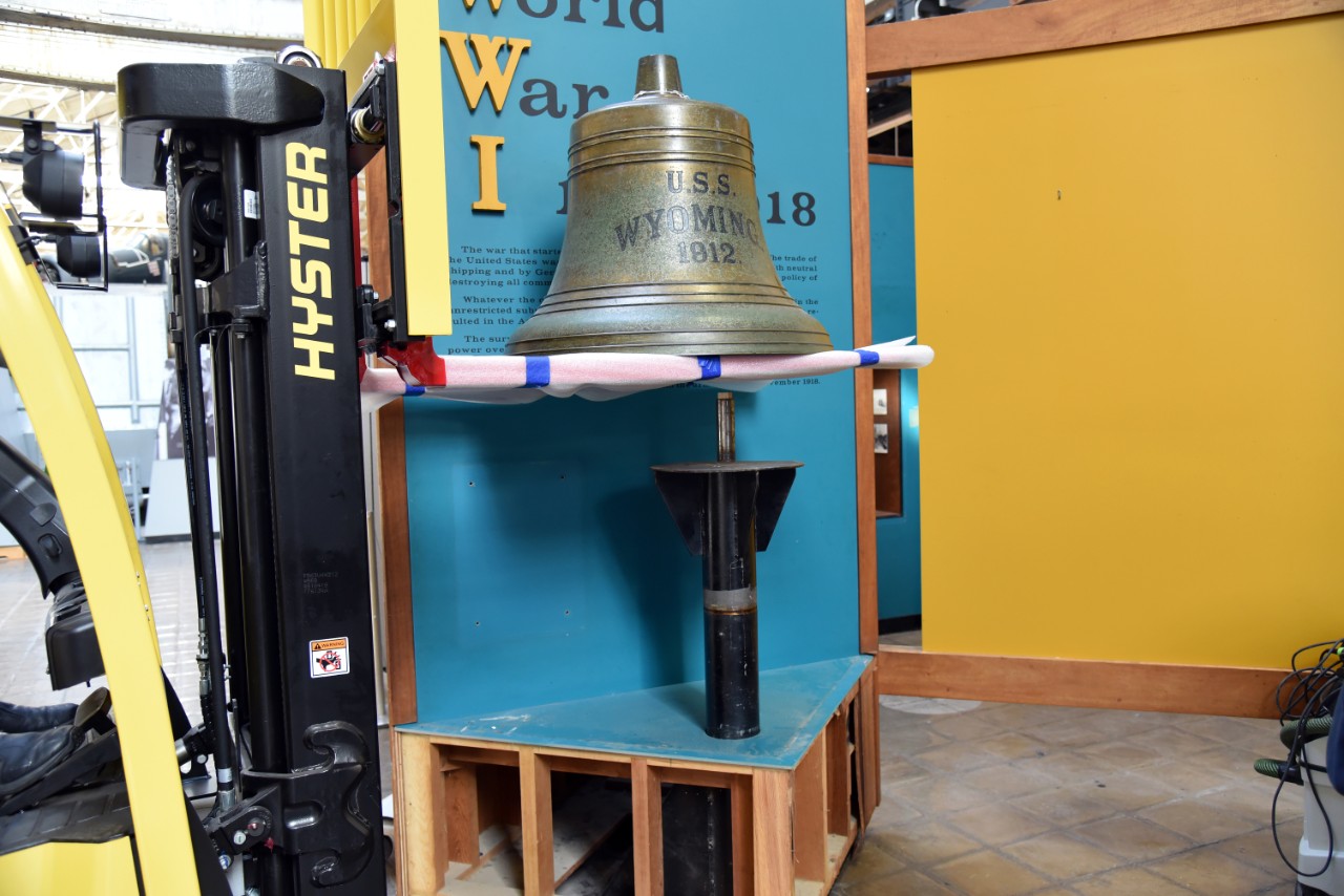 NMUSN-5133: USS Wyoming (BB-32), Ship’s Bell, December 2022. The bell is being removed by forklift from display base. Official U.S. National Museum of the U.S. Navy Photograph. Digital only.