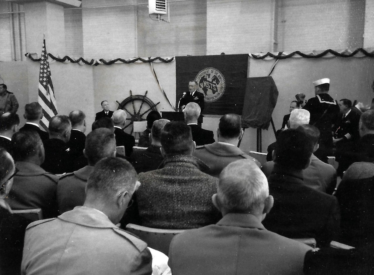 NMUSN-20:   USNS James M. Gilliss presentation at Naval Historical Display Center, Washington Navy Yard, Washington, D.C. December 14, 1962.    Rear Admiral Edward C. Stephan, USNR, gives remarks during the presentation at the Naval Historical Display Center (now the National Museum of the U.S. Navy).    This presentation was the first official ceremony held at the Display Center.   Rear Admiral Arthur R. Gralla and Captain Slade D. Cutter are to the right.  This presentation was the first official ceremony held at the Display Center.     The director at the time was World War II veteran, Captain Slade. D. Cutter, USN.  National Museum of the U.S. Navy Photograph Collection.    