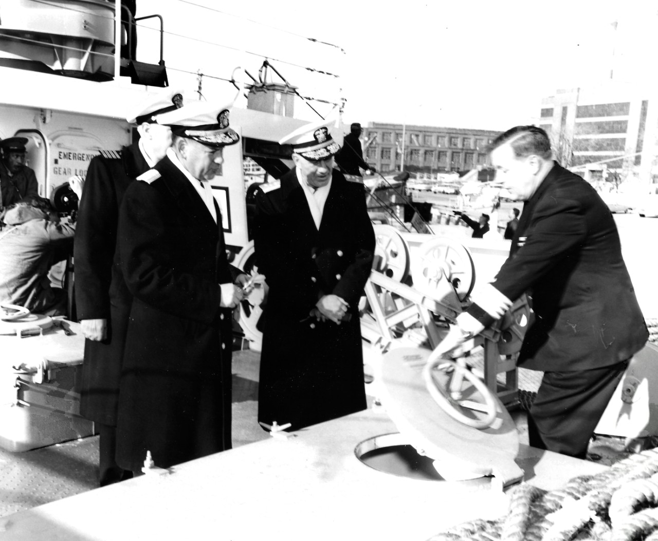 NMUSN-22:   USNS James. M. Gilliss (T-AGOR-4), December 1962.    Naval Historical Display Center’s Director, Captain Slade D. Cutter, USN, discusses with Vice Admiral Roy A. Gano, USN, Commander, Military Sea Transportation Service and Rear Admiral Edward C. Stephan, USN, the Chief Oceanographer of the Naval Oceanographic Office on board the oceanographic research ship.   National Museum of the U.S. Navy Photograph Collection.    