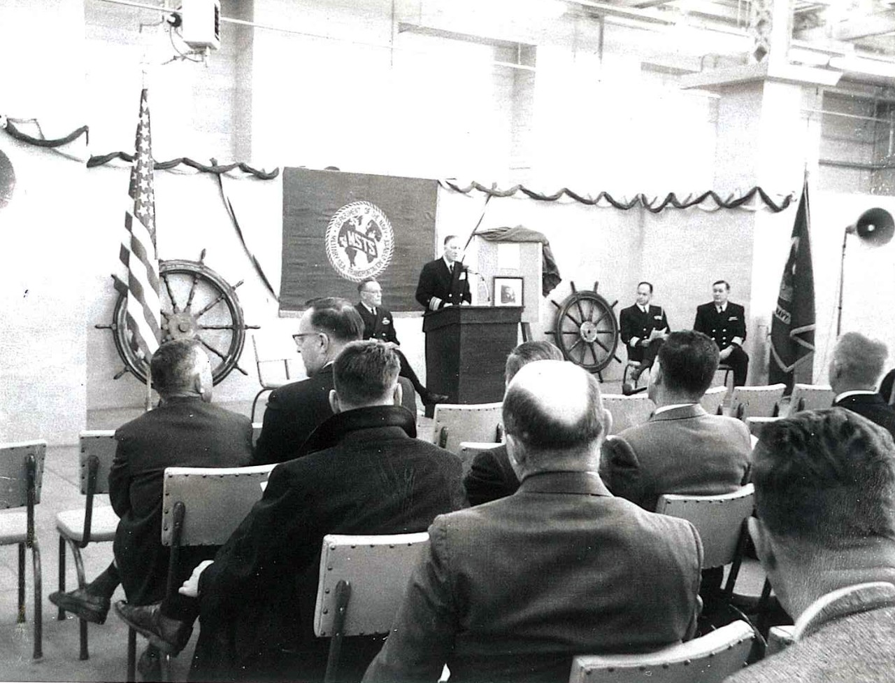 NMUSN-4563  USNS James M. Gilliss presentation at Naval Historical Display Center, Washington Navy Yard, Washington, D.C. December 14, 1962. Rear Admiral Edward C. Stephan, USNR, gives remarks during the presentation at the Naval Historical Display Center (now the National Museum of the U.S. Navy). This presentation was the first official ceremony held at the Display Center. Rear Admiral Arthur R. Gralla and Captain Slade D. Cutter are to the right. This presentation was the first official ceremony held at the Display Center. The director at the time was World War II veteran, Captain Slade. D. Cutter, USN. National Museum of the U.S. Navy Photograph Collection.