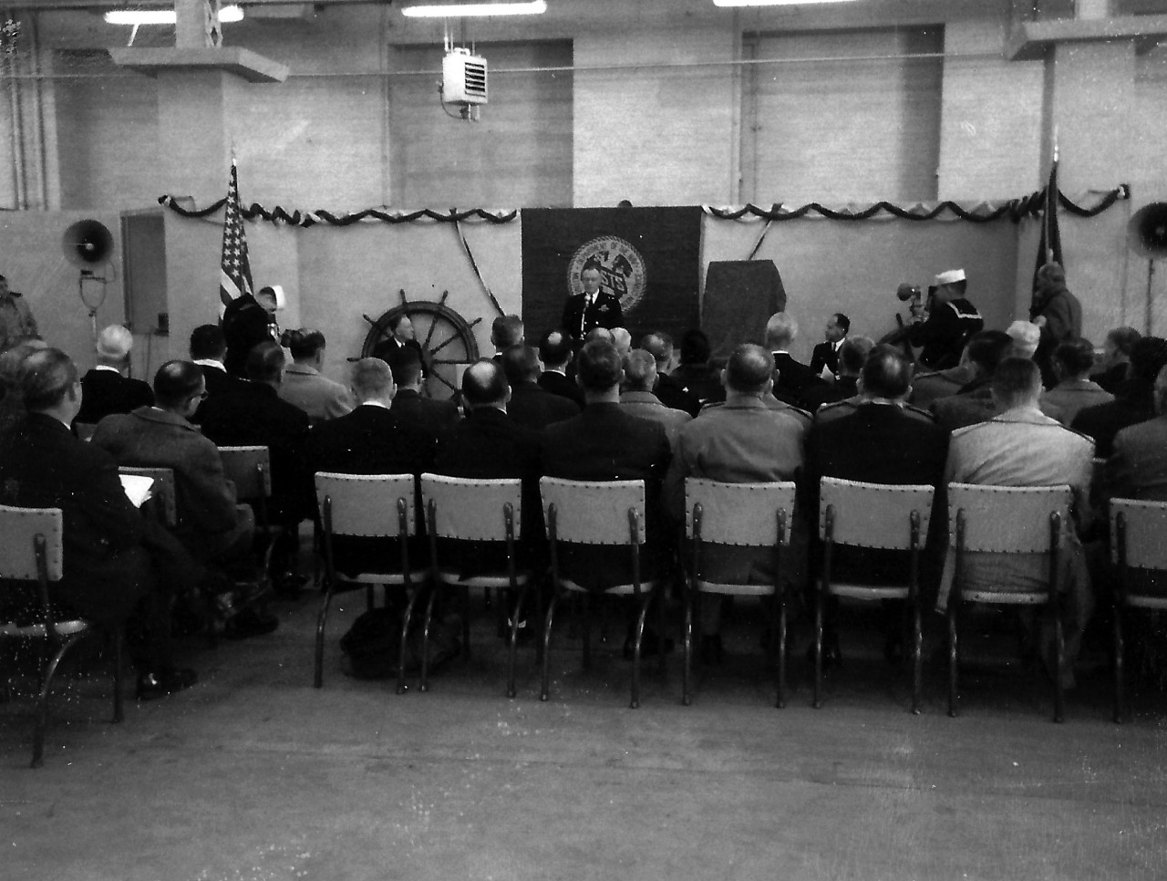 NMUSN-18:   USNS James M. Gilliss presentation at Naval Historical Display Center, Washington Navy Yard, Washington, D.C. December 14, 1962.    Rear Admiral Edward C. Stephan, USNR, gives remarks during the presentation at the Naval Historical Display Center (now the National Museum of the U.S. Navy).    This presentation was the first official ceremony held at the Display Center.   Rear Admiral Arthur R. Gralla and Captain Slade D. Cutter are to the right.  This presentation was the first official ceremony held at the Display Center.     The director at the time was World War II veteran, Captain Slade. D. Cutter, USN.  National Museum of the U.S. Navy Photograph Collection.    