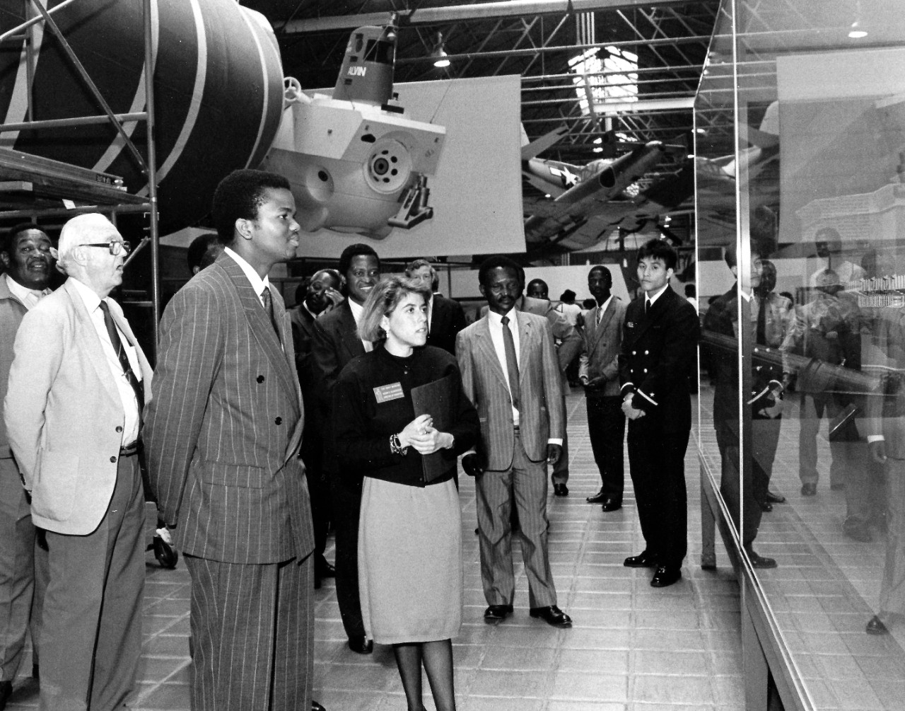 NMUSN-54:   King of Swaziland, Mswati III, 1989.  Looking at a ship model while visiting the Navy Museum, Washington, D.C.     National Museum of the U.S. Navy Photograph Collection.  
