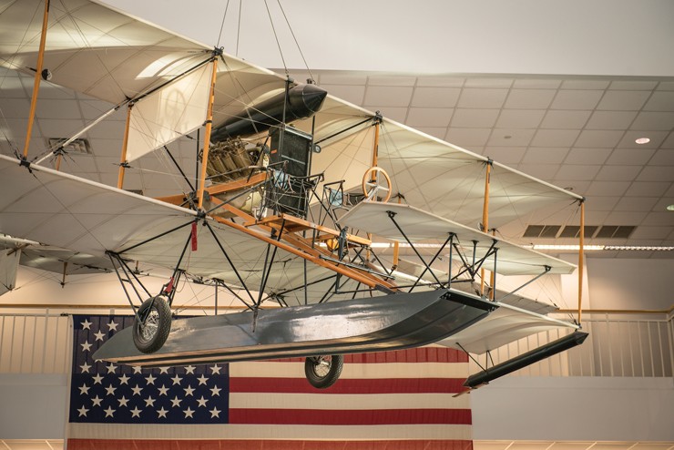 Photo of a replica of the Navy's first aircraft at the National Naval Aviation Museum