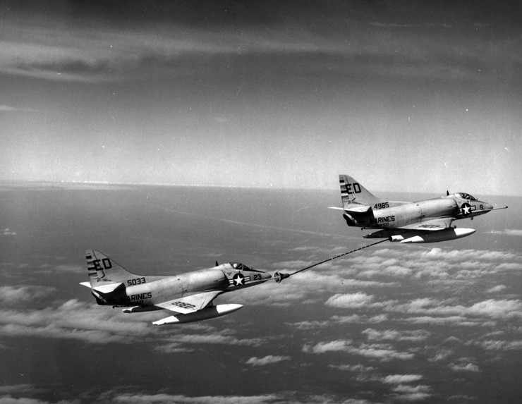 Photo of Marine Corps A-4 Skyhawks pictured during in-flight refueling.