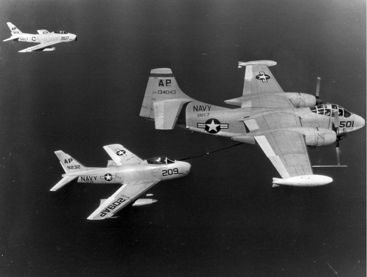 Photo of an AJ-2 Savage aircraft refueling an FJ-3M Fury fighter in flight
