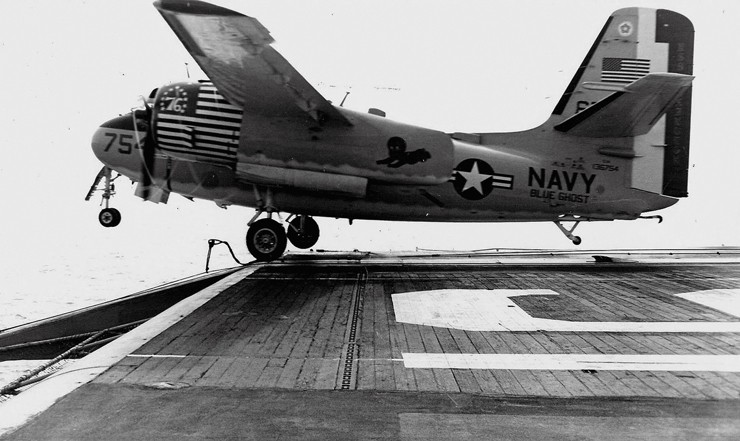 Phtoto of the C-1A Trader now displayed at the museum launching from the aircraft carrier Lexington (CVT 16).