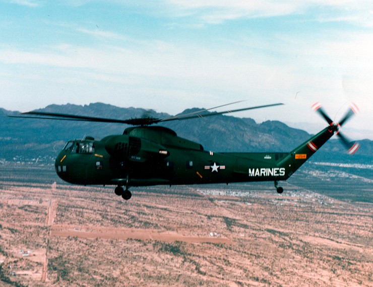 Photo taken in color showing a CH-37 Mojave helicopter in flight.