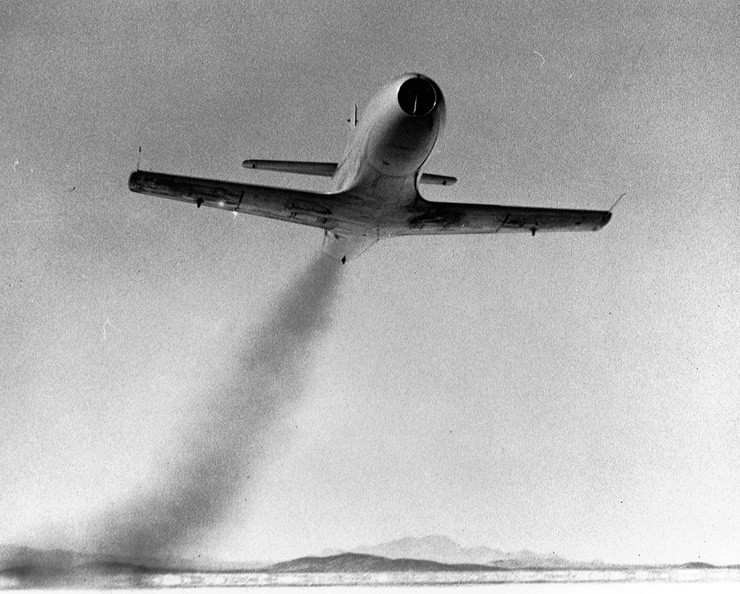 Photo of D-558-1 Skystreak making a high-speed pass at low altitude at Muroc Army Air Field.