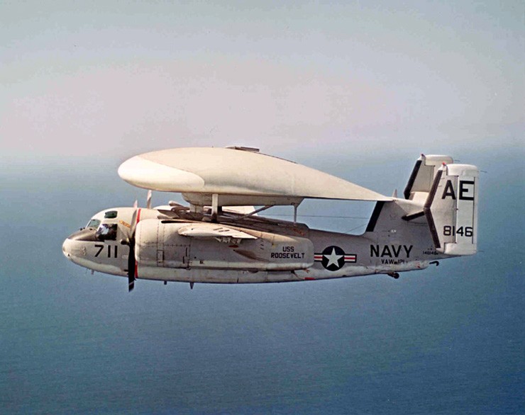 Photo of the E-1B Tracer now displayed at the museum in flight during its operational service.