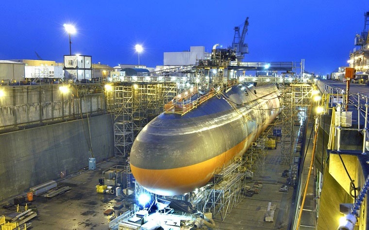 Night falls at Puget Sound Naval Shipyard and Intermediate Maintenance Facility as work continues on the strategic missile submarine USS <i>Ohio</i> (SSGN 726), 2004.