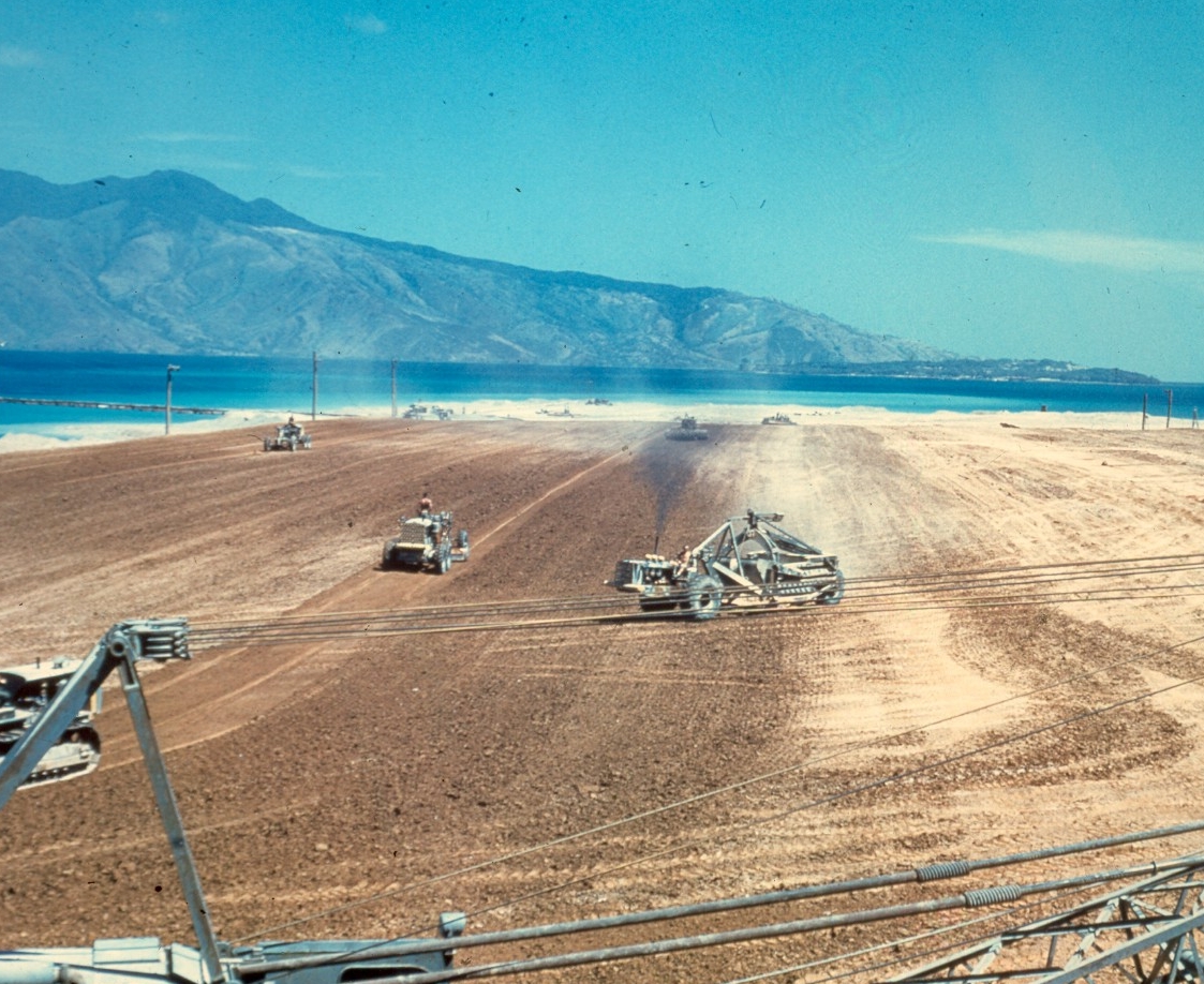 <p>Colorized photograph of Seabees preparing for airstrip construction</p>
