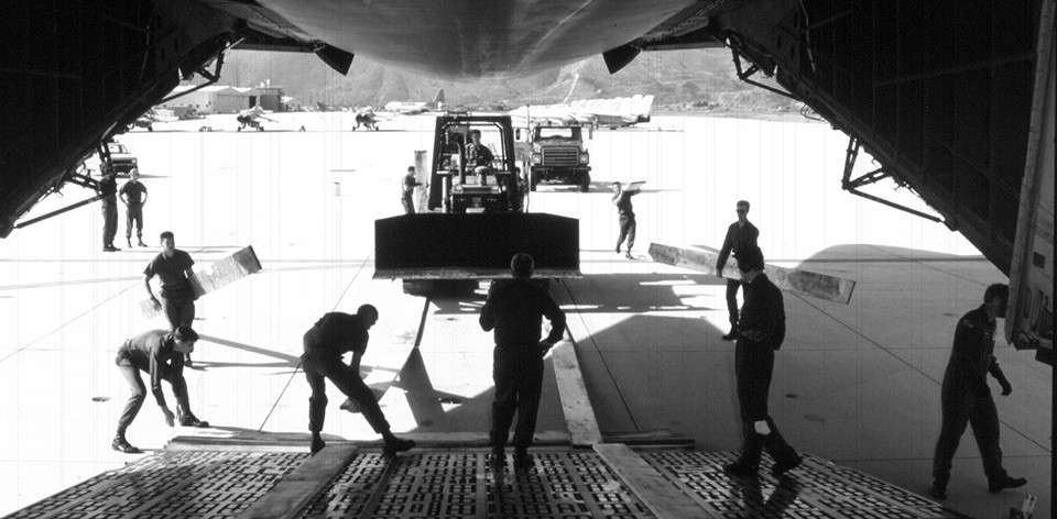Seabees from Naval Mobile Construction Battalion Forty load up their equipment for their deployment to Mogadishu, Somalia, December 1992.