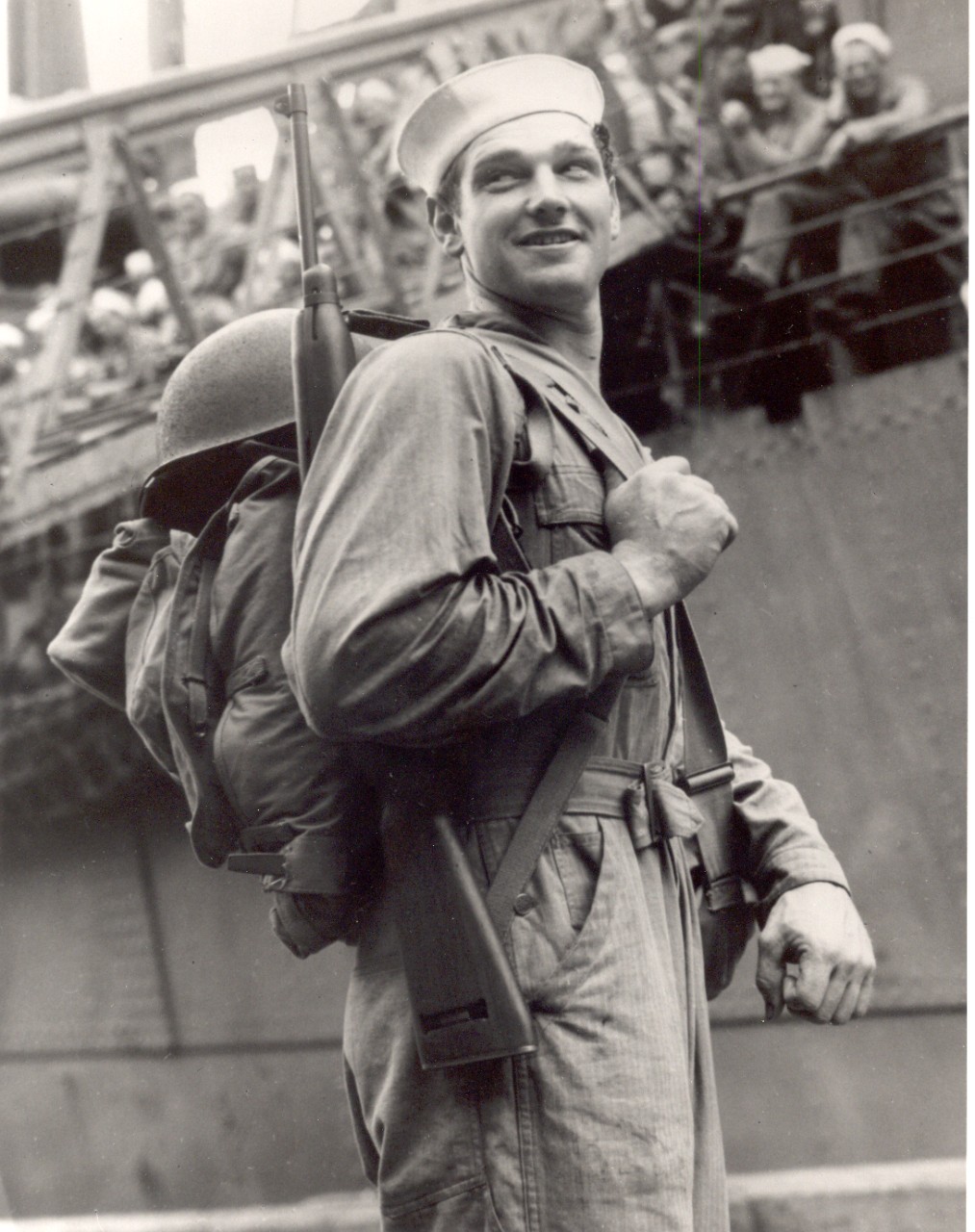 Seabee Lloyd Piercy getting ready to board a ship for the Pacific Theater, circa 1942.