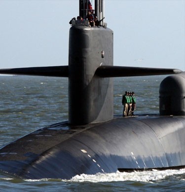 a submarine cruising on top of the water
