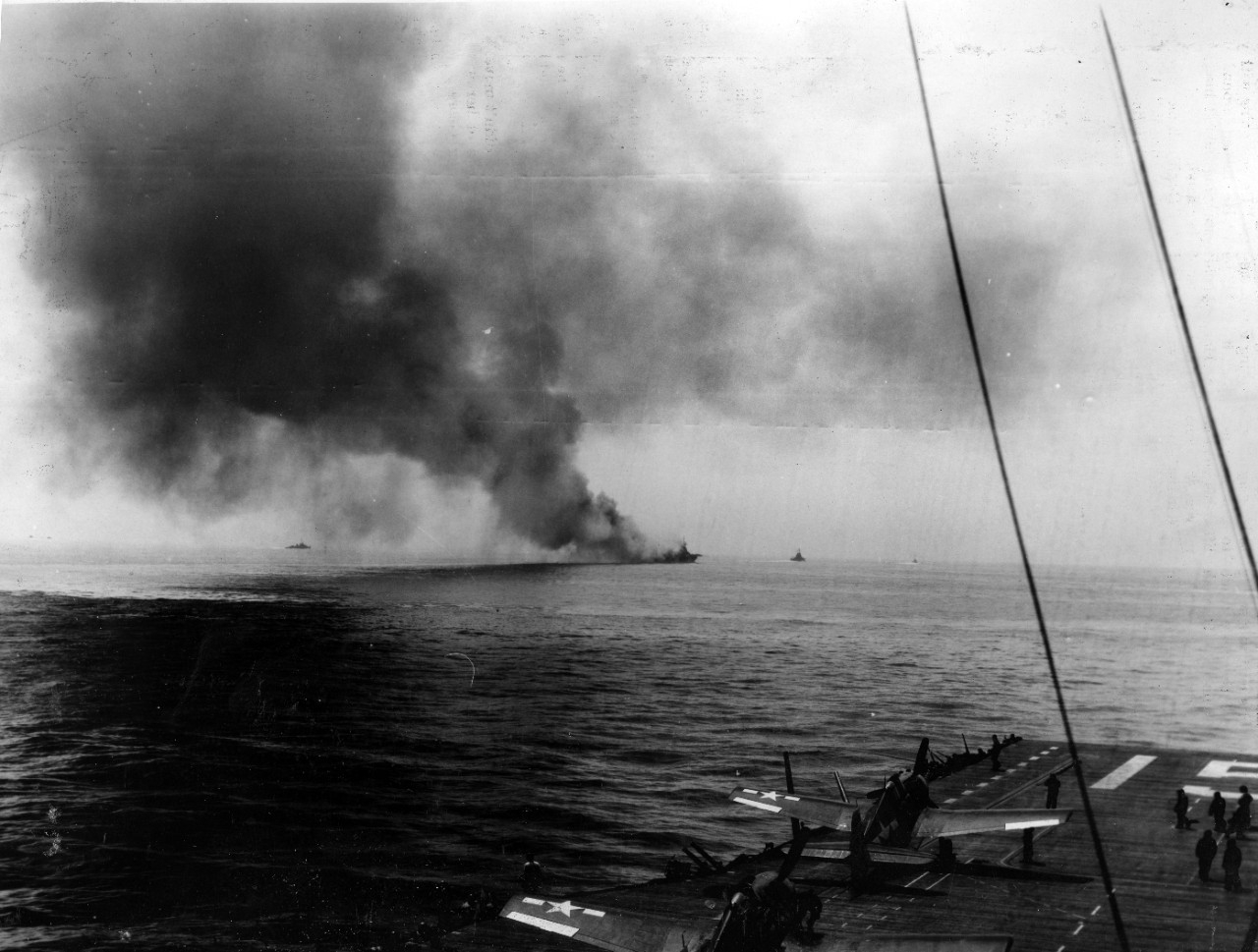 S-100-H.001 USS Bunker Hill (CV 17) burning after kamikaze attack - 11 May 1945