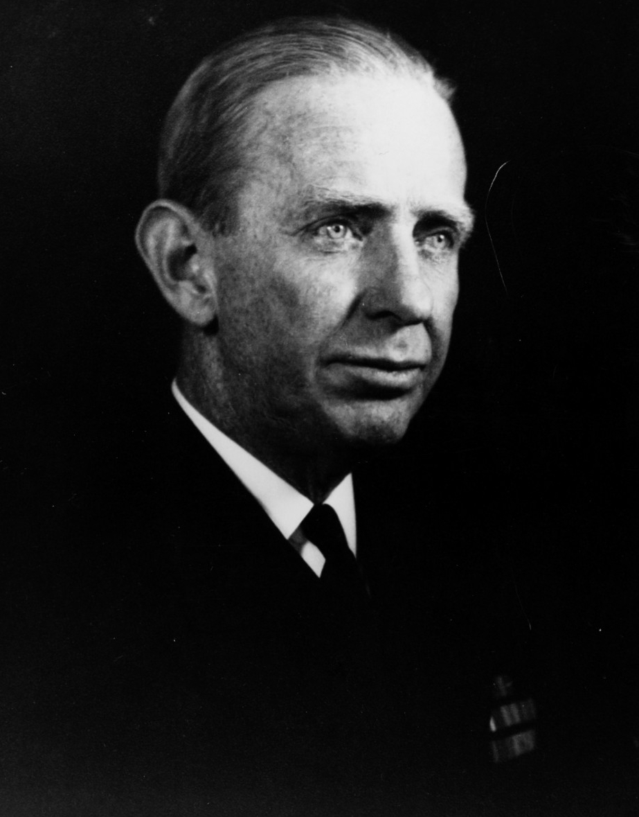 Black-and-white portrait of Rear Admiral William R. Purnell. He is shown in three-quarters profile and wears an officer’s uniform.
