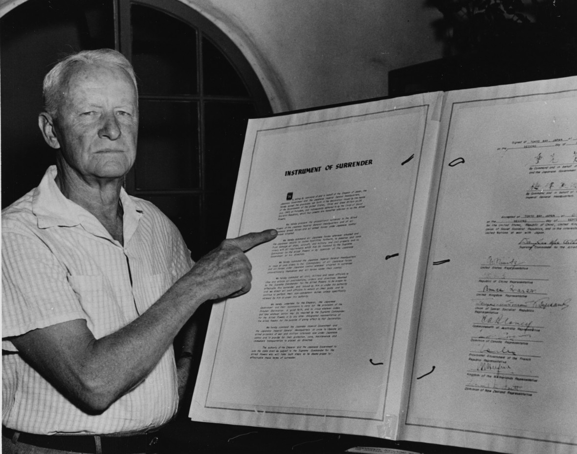 Fleet Admiral Nimitz with the Instrument of Surrender of the Japanese Empire