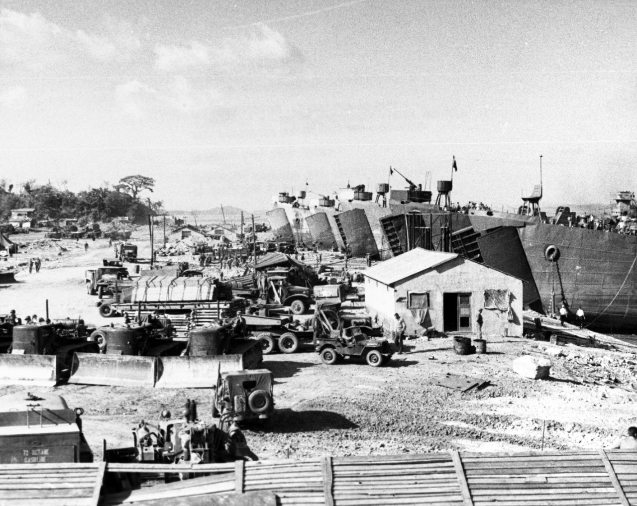 LSTs loading First Marine Division equipment at Inchon in preparation for the Wonsan operation, 13 October 1950.