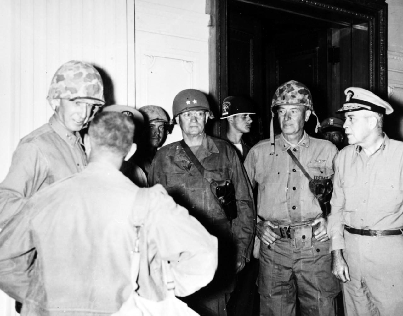 Senior U.S. commanders assembled for the formal ceremonies in which General of the Army Douglas MacArthur returned the capital city to the Republic of Korea government, 29 September 1950.