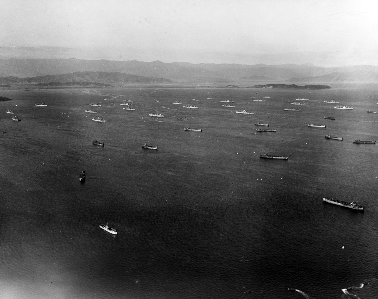 Shipping in the outer harbor at Wonsan, North Korea, during the landing of the First Marine Division, 26 October 1950. 