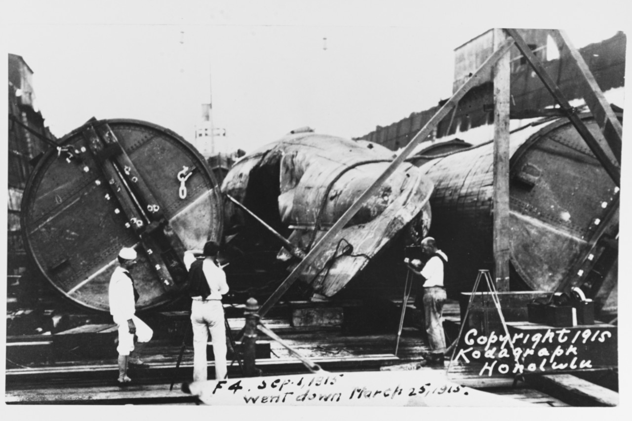 F-4 in drydock at Honolulu, Hawaii, after being raised from over 300 feet of water and towed to port, 1 September 1915. (NH 74733)