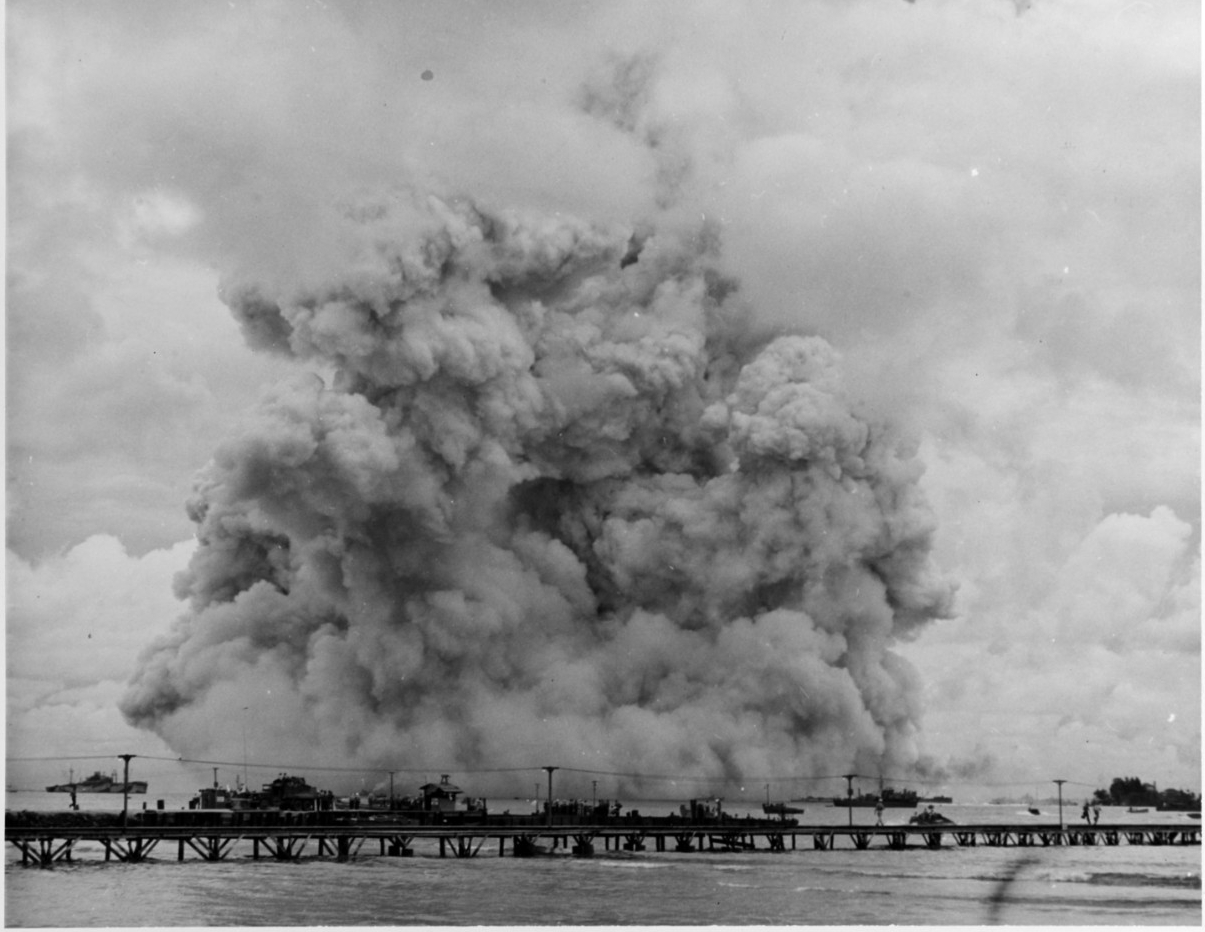 Smoke cloud expanding immediately after Mount Hood exploded in Seeadler harbor, 10 November 1944. (NH 65604)