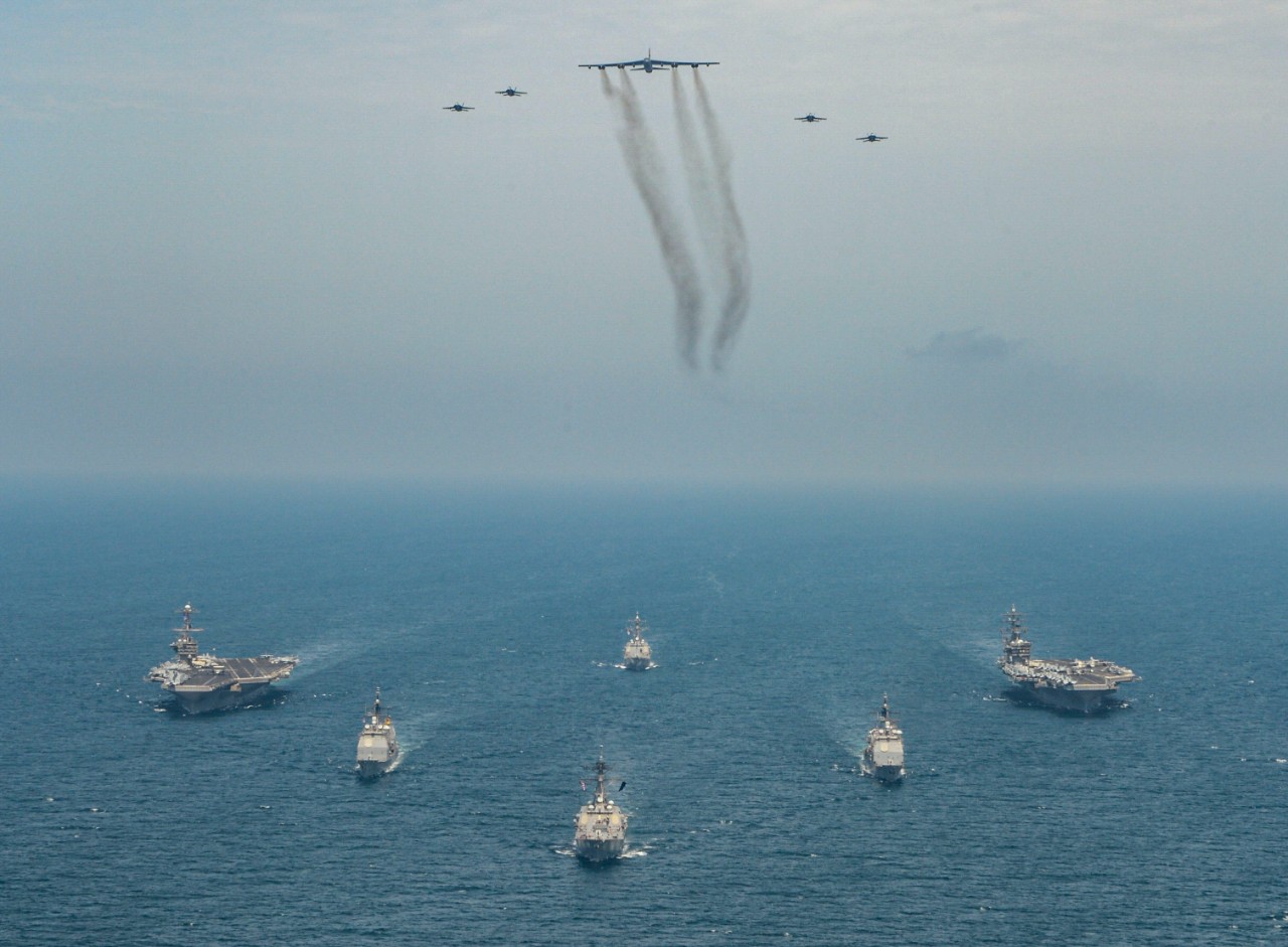 200321-N-MQ631-1015 ARABIAN SEA (March 21:: 2020) The Dwight D. Eisenhower and Harry S. Truman Carrier Strike Groups conduct dual carrier and joint air wing operations with a B-52H Stratofortress in the Arabian Sea March 21. The Eisenhower and Tr...