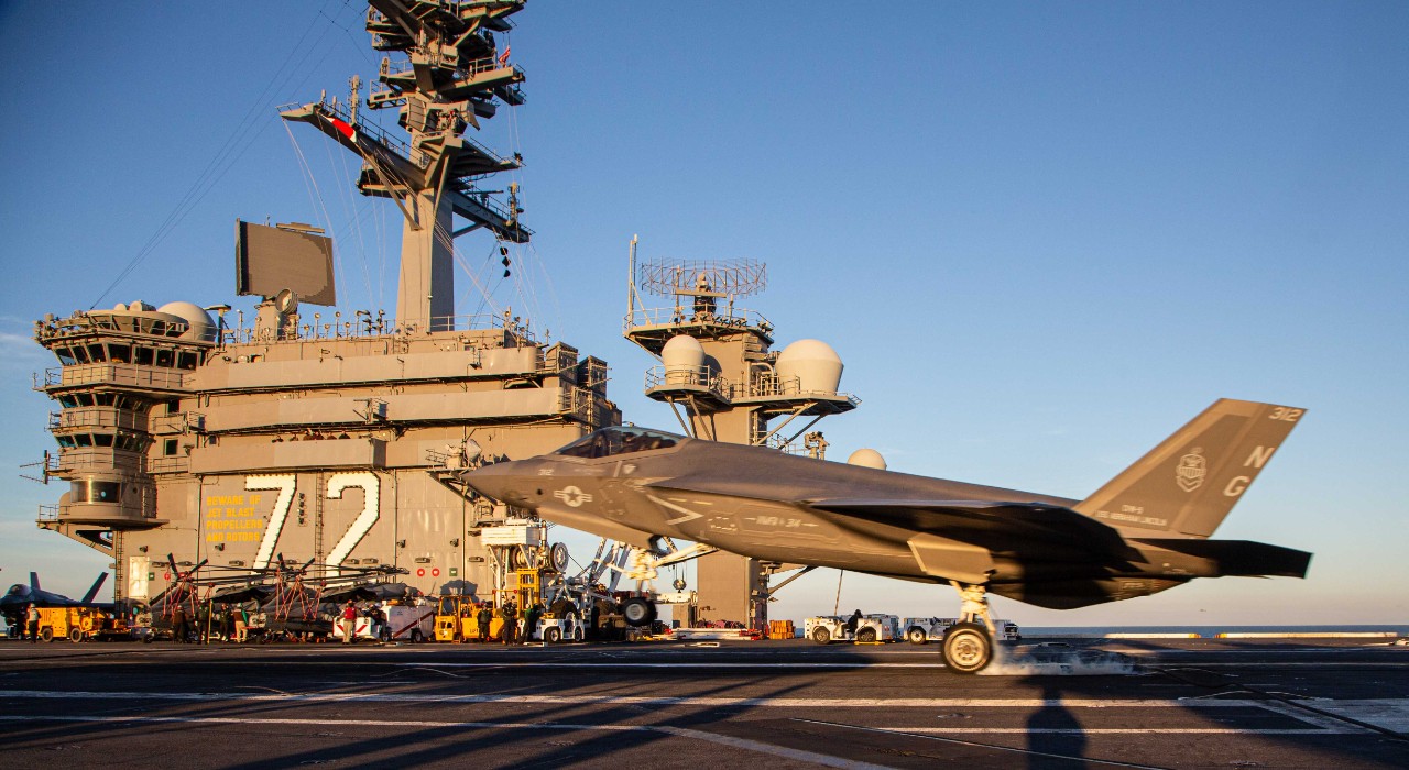 PACIFIC OCEAN (Jan. 3, 2022) An F-35C Lightning II assigned to Marine Fighter Attack Squadron (VMFA) 314 lands aboard the aircraft carrier USS Abraham Lincoln (CVN 72) as VFA-314 prepares to deploy alongside the Navy as an integrated part of Carr...