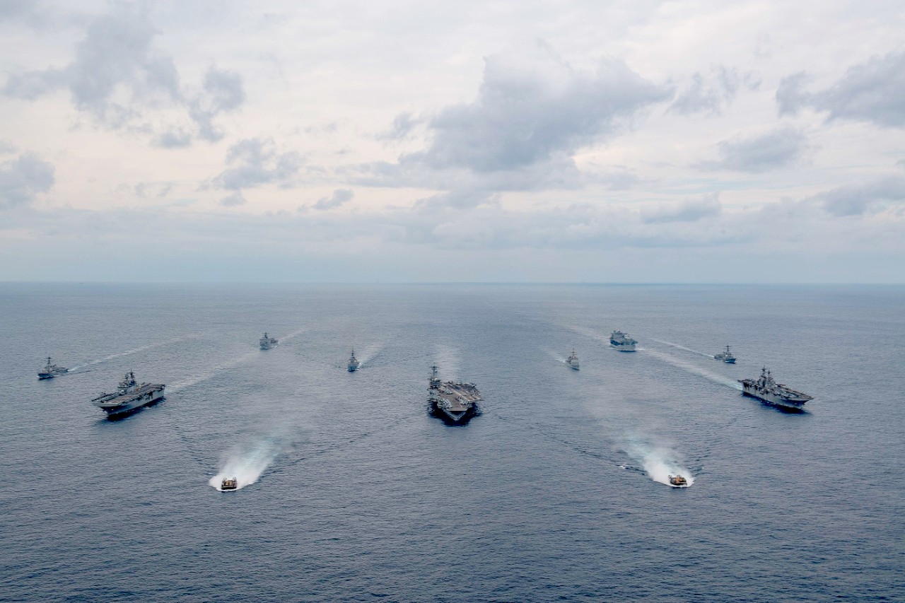 PHILIPPINE SEA (Feb. 7, 2022) Ships of the America and Essex Amphibious Ready Groups, and Carrier Strike Group (CSG) 3, sail in formation in the Philippine Sea with the Japan Maritime Self-Defense Force during exercise Noble Fusion. Front row: La...
