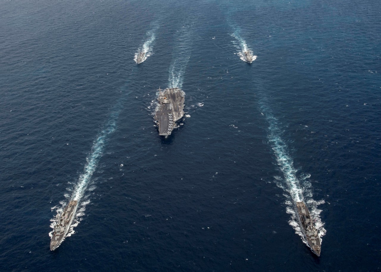 ATLANTIC OCEAN (March 6, 2022) The aircraft carrier USS George H.W. Bush (CVN 77), center, and ships from the George H.W. Bush Carrier Strike Group transit the Atlantic Ocean following a straits transit training event. The George H.W. Bush Carrie...