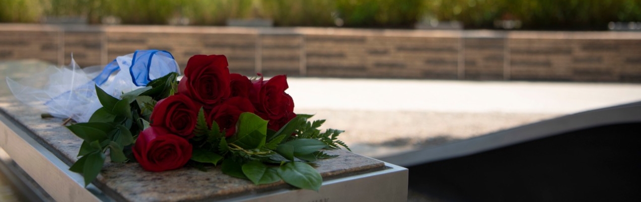 A bouquet lies on a bench at the National 9/11 Pentagon Memorial at the Pentagon in Arlington, Virginia, 11 September 2019