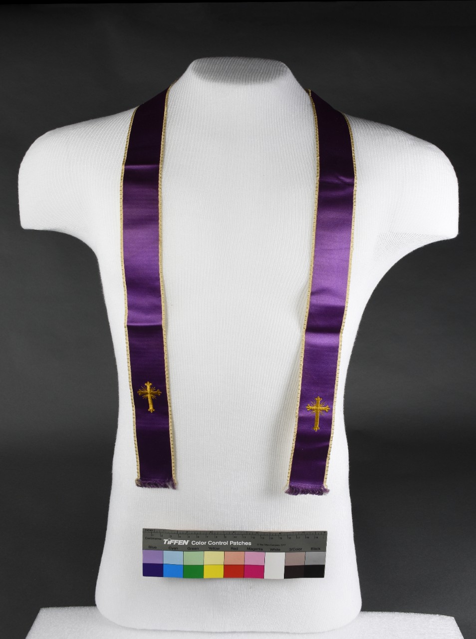 Purple ribbon sash with gold embroidered crosses and edges belonging to LT JF Crotty 
