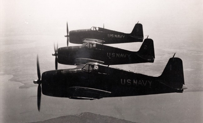 Three Blue Angels F6F Hellcats in flight