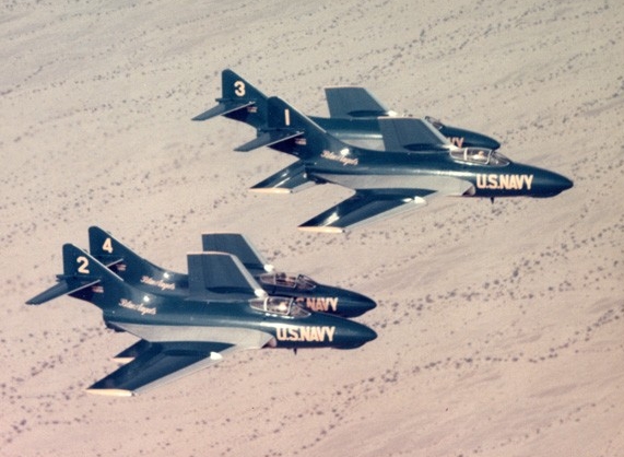 Four Blue Angels F9F Cougars in flight