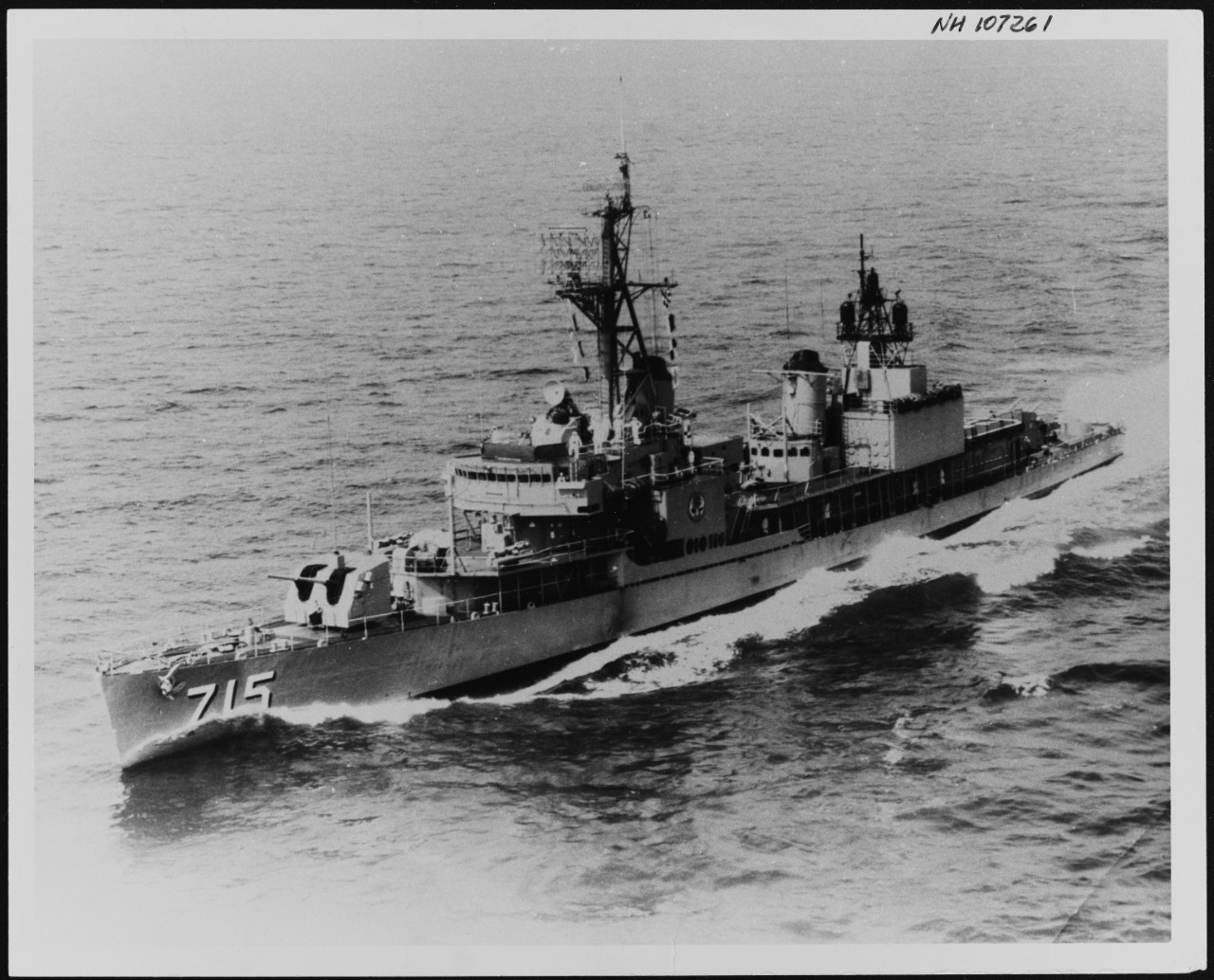 black white photo of portside view ship underway at sea